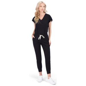 Sold!             Free People Philanthropy black jumpsuit